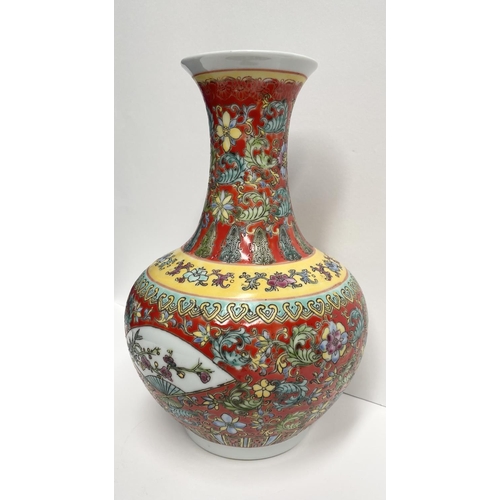 10 - A CHINESE FAMILLE-ROSE BOTTLE VASE, Qianlong period, the compressed globular body rising to a waiste... 