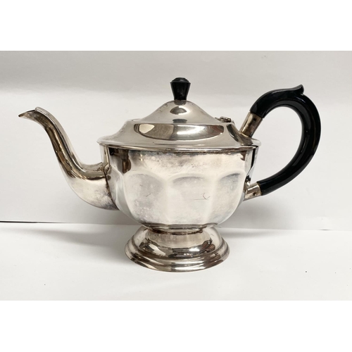 106 - A SILVER PLATED LOT TO INCLUDE (i) A silver plated teapot, with shaped resin handle and finial, on c... 