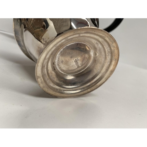 106 - A SILVER PLATED LOT TO INCLUDE (i) A silver plated teapot, with shaped resin handle and finial, on c... 