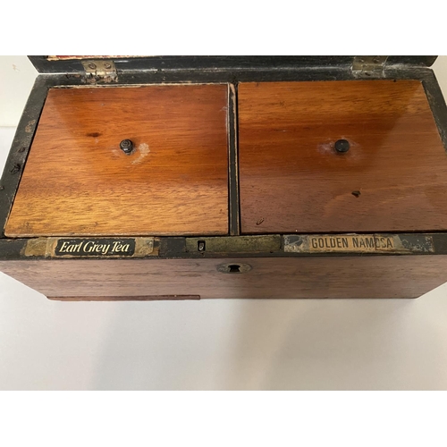 109 - A VICTORIAN MAHOGANY TEA CADDY, opening to two compartments, labelled, with measuring spoon, Dimensi... 