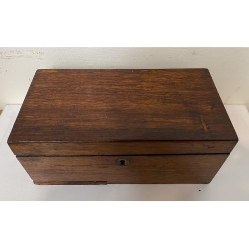 109 - A VICTORIAN MAHOGANY TEA CADDY, opening to two compartments, labelled, with measuring spoon, Dimensi... 