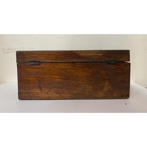 109 - A VICTORIAN MAHOGANY TEA CADDY, opening to two compartments, labelled, with measuring spoon, Dimensi... 