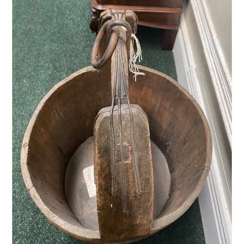 111 - TWO ANTIQUE ROUND COOPERED WOODEN WATER BUCKETS, one with iron binding, both with carrying handles, ... 