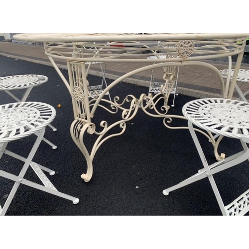 115 - A FINE FRENCH STYLE CIRCULAR GARDEN/PATIO TABLE AND CHAIRS SET, cast iron, with ornate design to gla... 