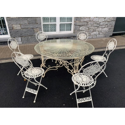 115 - A FINE FRENCH STYLE CIRCULAR GARDEN/PATIO TABLE AND CHAIRS SET, cast iron, with ornate design to gla... 