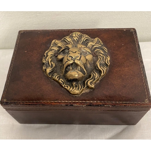 116 - A PAIR OF UNIQUE LEATHER BOUND BOOK STANDS, brown leather mounted with solid brass lion head door kn... 