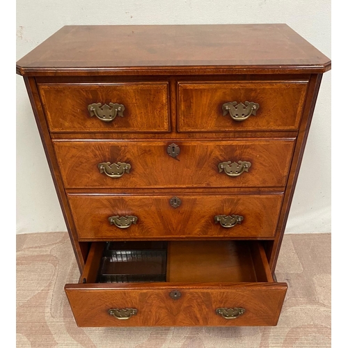 12 - A WALNUT CHEST/DRINKS CABINET, with crossbanding, lift-top revealing interior storage, three drawers... 