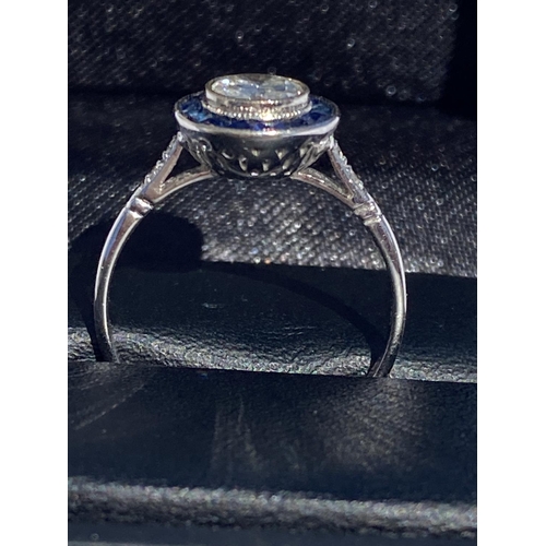 123 - AN EXCEPTIONAL 18CT WHITE GOLD ART DECO DIAMOND AND SAPPHIRE TARGET RING, centre diamond weight: .70... 