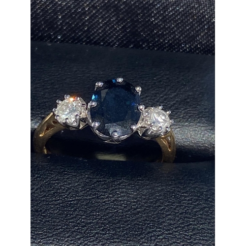 125 - A VINTAGE 18CT YELLOW GOLD SAPPHIRE AND DIAMOND THREE STONE RING, sapphire 2.00cts, diamond weight .... 