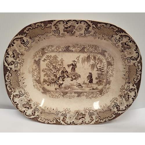 133 - A PAIR OF LARGE STONEWARE PLATTERS; each with brown & white decoration; showing figures and birds in... 