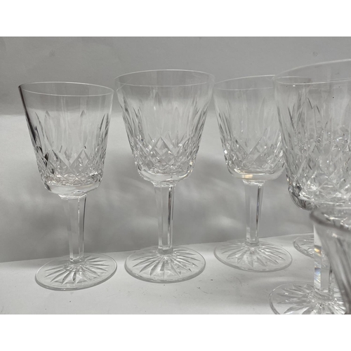 158 - A GLASS LOT TO INCLUDE eight cut glass wine glasses with star cut circular bases, along with five li... 