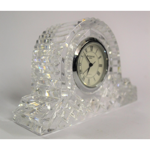 175 - A SMALL WATERFORD CRYSTAL QUARTZ BEDSIDE CLOCK, small in size with fluted glasswork; clockpiece manu... 