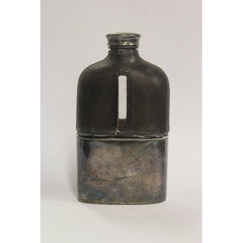 177 - AN ANTIQUE LEATHER AND SILVERPLATED FLASK, with leather to the top, and silverplating to the bottom ... 