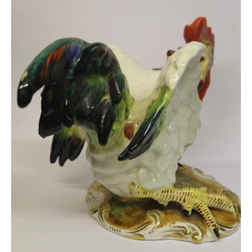 178 - A CAPO DI MONTE CERAMIC ROOSTER, likely of the 20th century, resting on painted base