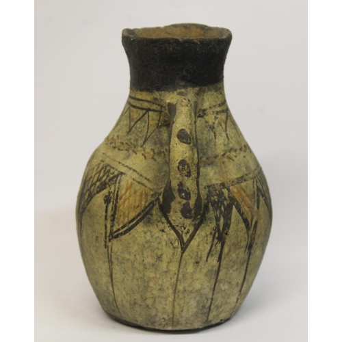 179 - AN 18TH-19TH CENTURY BERBER JUG, hand painted pottery jug in Berber style, being a unique example fr... 