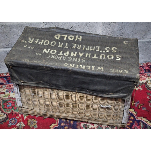 185 - A BRITISH SECOND WORLD WAR/POST-WAR WICKER STORAGE BASKET, top of basket covered in tarp with painte... 