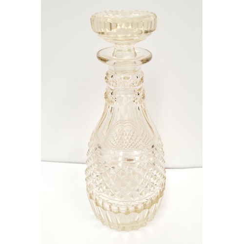 189 - TWO IRISH CUT GLASS DECANTERS, (i) one with three ring neck and stopper the body with simple vertica... 