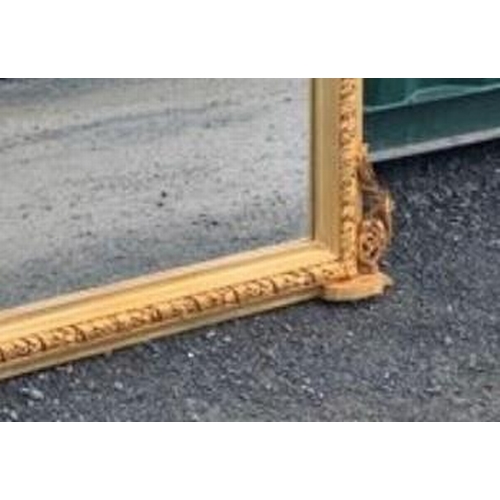 2 - A VERY FINE LARGE GILT OVERMANTLE MIRROR, of arched form, mirror within a finely carved frame with o... 