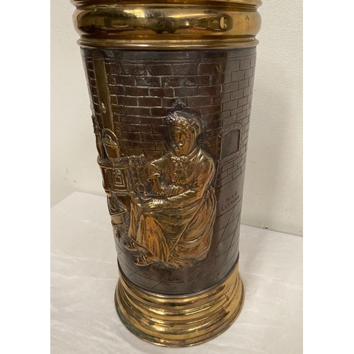 205 - A MID CENTURY BRASS EMBOSSED UMBRELLA STAND, finely decorated with embossed country scene depicting ... 