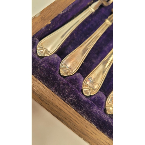 212 - A CASED SET OF ELECTRO PLATED DESSERT CUTLERY, includes; 12 knives and 12 forks, in nice case.