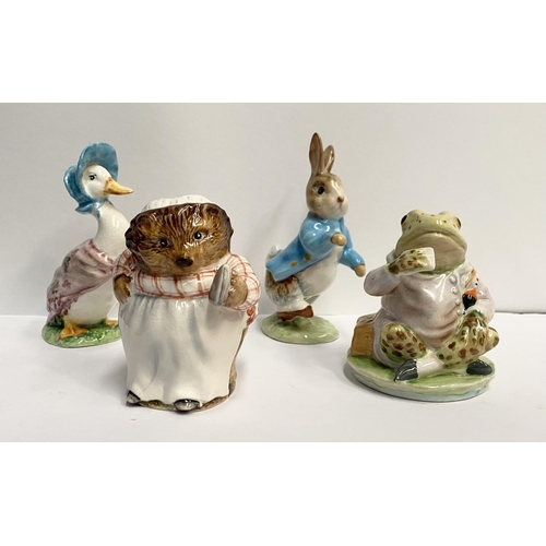 229 - A COLLECTION OF BEATRIX POTTER BESWICK ENGLAND FIGURINES TO INCLUDE (i) Mrs Jiggly Winkle, numbered ... 