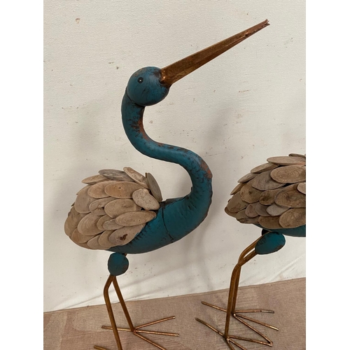 239 - A PAIR OF STEEL PAINTED STORK GARDEN ORNAMENTS, decorated with carved wooden feathers, Dimensions: 1... 