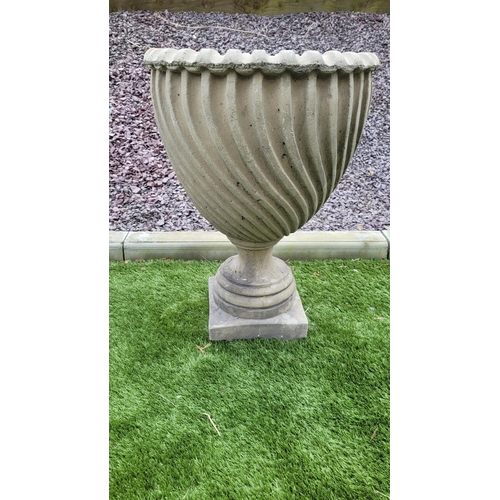 250 - A PAIR OF GARDEN URNS, 	with fantastic barley twist design to the tapered body which sits upon a squ... 