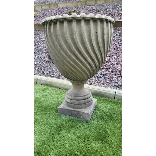 250 - A PAIR OF GARDEN URNS, 	with fantastic barley twist design to the tapered body which sits upon a squ... 