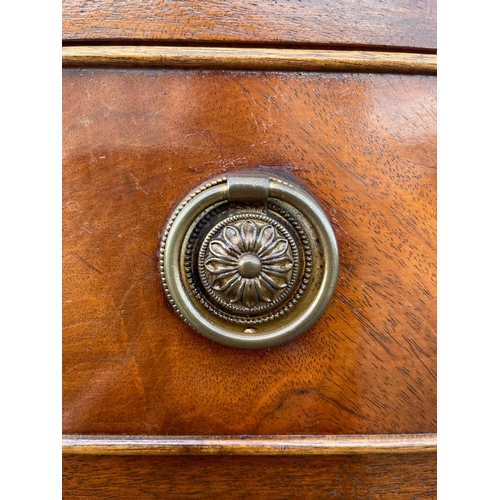 29 - A MAHOGANY BREAK FRONT SECRETAIRE LIBRARY BOOKCASE, with dentil cornice, architectural glazed doors ... 