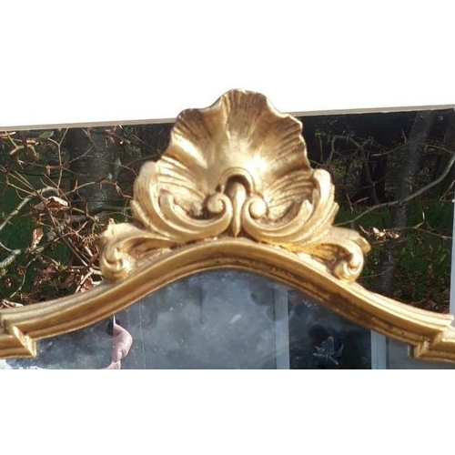 30 - A FRENCH LOUIS XV STYLE GILTWOOD WALL MIRROR, this fine mirror has a cartouche shaped frame and beau... 