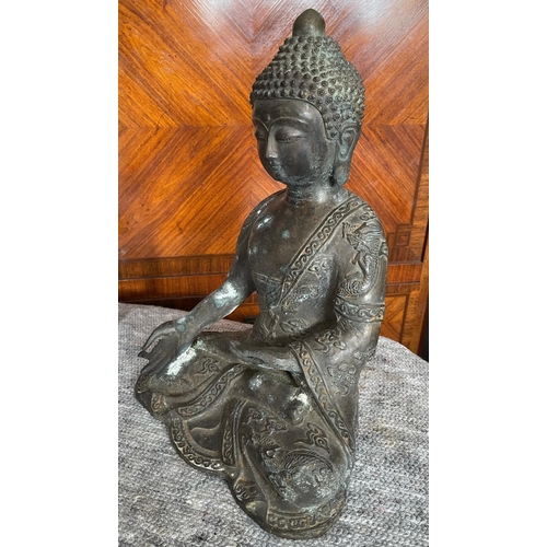 41 - A CHINESE BRONZE SHAKYAMUNI BUDDHA SCULPTURE, the historical Gautama Buddha, in a double-lotus seati... 