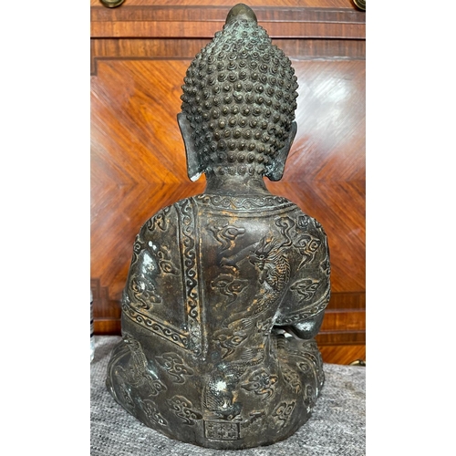 41 - A CHINESE BRONZE SHAKYAMUNI BUDDHA SCULPTURE, the historical Gautama Buddha, in a double-lotus seati... 