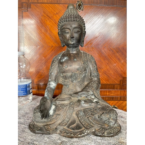 41 - A CHINESE BRONZE SHAKYAMUNI BUDDHA SCULPTURE, the historical Gautama Buddha, in a double-lotus seati... 