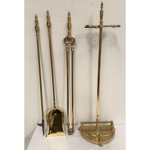 44 - A BRASS STAND WITH FIRE IMPLEMENTS, stand with shaped galleried base, includes shovel, poker and ton... 