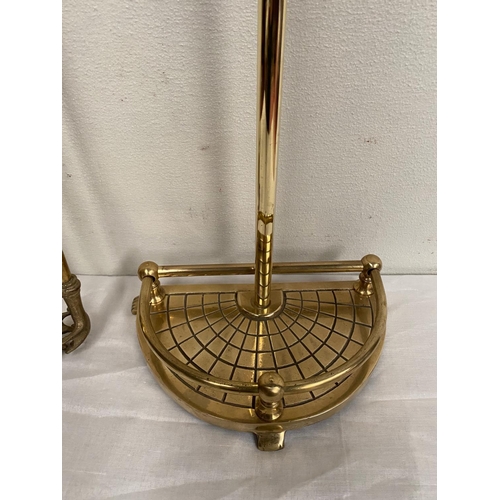 44 - A BRASS STAND WITH FIRE IMPLEMENTS, stand with shaped galleried base, includes shovel, poker and ton... 