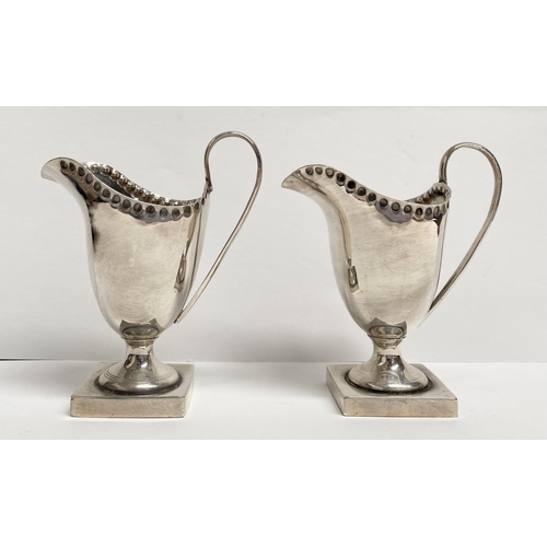 53 - A PAIR OF ANTIQUE CENTURY SILVER CREAM JUGS, Maker George Nathan & Ridley Hayes, Icknield Street & H... 