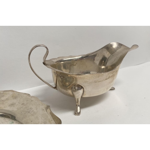 56 - A SILVER AND SILVER PLATED LOT TO INCLUDE (i) A silver sauce boat, Maker Viner's Ltd (Emile Viner), ... 