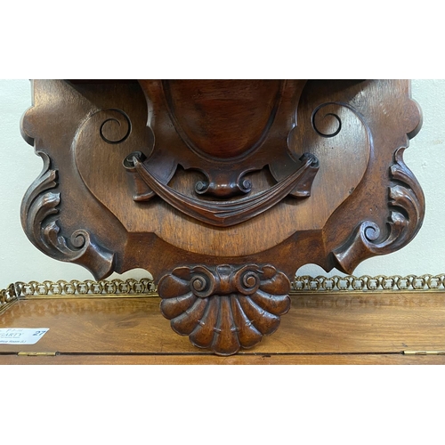 64 - A 19TH CENTURY IRISH MAHOGANY WALL BRACKET, ornately carved with shell motif, Dimensions: 34cm high ... 