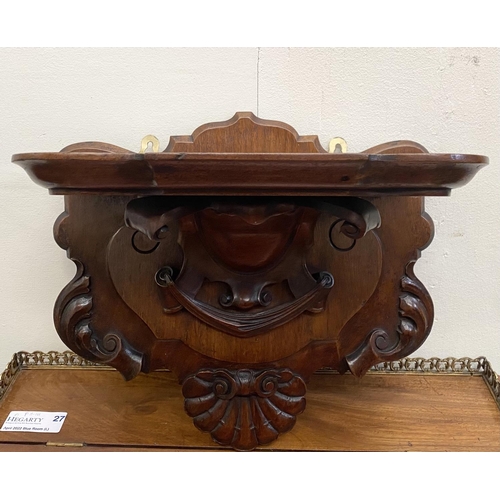 64 - A 19TH CENTURY IRISH MAHOGANY WALL BRACKET, ornately carved with shell motif, Dimensions: 34cm high ... 