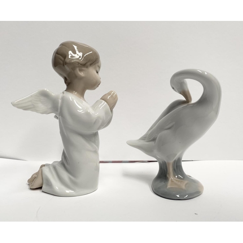 73 - A BEAUTIFUL LLADRO ANGEL PRAYING FIGURINE, along with LLadro duck figurine, with beak in wing, both ... 