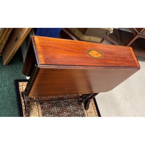 74 - A MAHOGANY INLAID SUTHERLAND TABLE, with crossbanding and central shell inlay to top, turned legs an... 