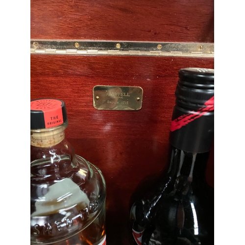 76 - A MARTELL COGNAC MAHOGANY DRINKS CABINET BOX, with brass mounts, locking mechanism, opening to stora... 