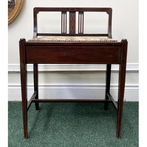 86 - AN EDWARDIAN MAHOGANY INLAID PIANO STOOL, with tapestry upholstered seat, lift up sheet music compar... 