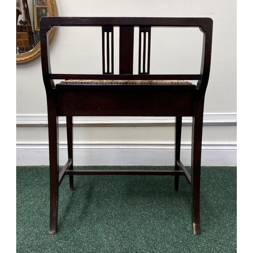 86 - AN EDWARDIAN MAHOGANY INLAID PIANO STOOL, with tapestry upholstered seat, lift up sheet music compar... 