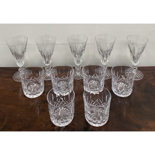 88 - A WATERFORD CRYSTAL LOT TO INCLUDE (i) a set of five Eileen cut champagne flutes, with star cut base... 