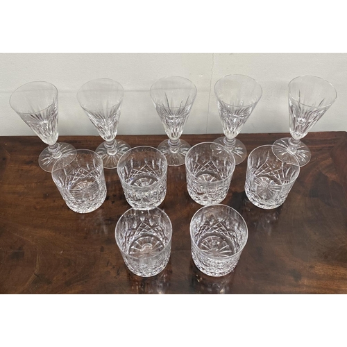 88 - A WATERFORD CRYSTAL LOT TO INCLUDE (i) a set of five Eileen cut champagne flutes, with star cut base... 