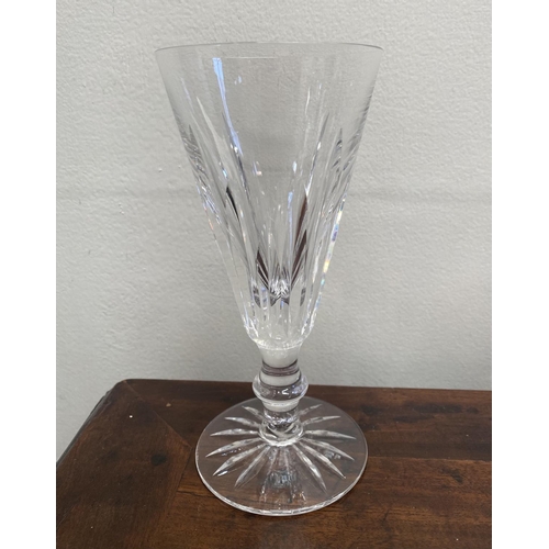 88 - A WATERFORD CRYSTAL LOT TO INCLUDE (i) a set of five Eileen cut champagne flutes, with star cut base... 