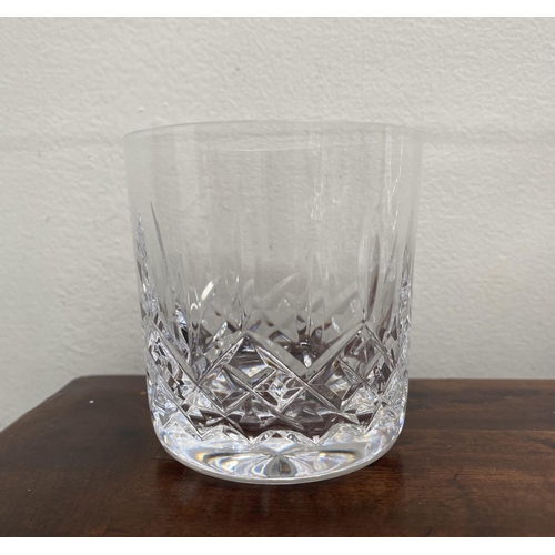 88 - A WATERFORD CRYSTAL LOT TO INCLUDE (i) a set of five Eileen cut champagne flutes, with star cut base... 