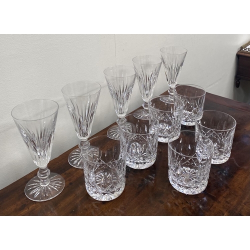 88 - A WATERFORD CRYSTAL LOT TO INCLUDE (i) a set of five Eileen cut champagne flutes, with star cut base... 