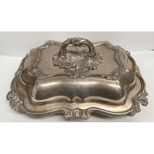 92 - A PAIR OF EARLY 20TH CENTURY SILVER PLATED ENTRÉE DISHES, finely decorated with scroll shaped edge a... 